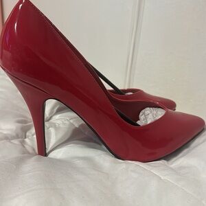 Red stiletto point toe heels